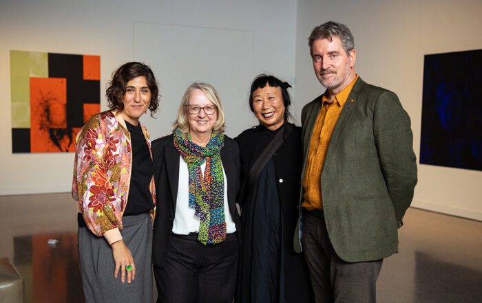Artist Lindy Lee (second from right) with John Curtin Gallery representatives (left to right) Collections Manager, John Curtin Gallery, Lia McKnight, Deputy Director Jane King and Director John Curtin Gallery, Chris Malcolm, Lindy Lee: Moon in a Dew drop opening event, 2022. Image: Ezra Alcantra.